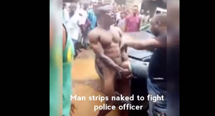 Naked man fights Police officer