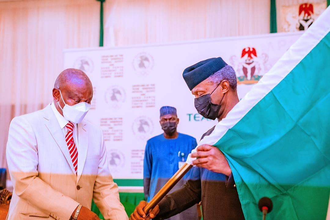 Osinbajo carrying Nigerian Flag
