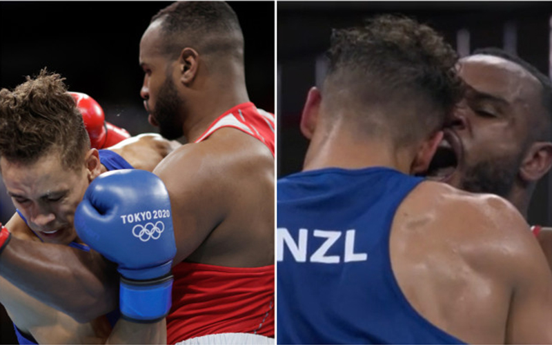 Olympic boxers tries to bite opponent's ear