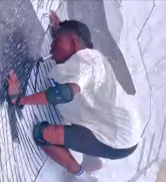 Nigerian artist, Nuel Geoffrey attempts GWR for largest drawing by mouth